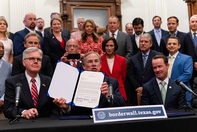Abbott, flanked by top Republicans at a press conference in June 2021, detailed a plan for Texas to build its own border wall. - Texas Tribune / Sophie Park