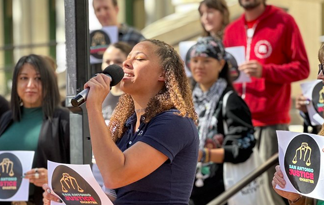 Act 4 SA Executive Director Ananda Tomas speaks during an October rally in front of City Hall. - Michael Karlis
