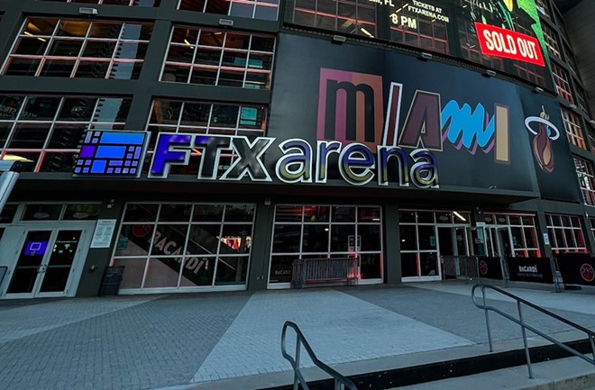 he logo of FTX at the entrance of the FTX Arena in Miami in August. The bankrupt crypto exchange is currently facing numerous state, federal and international investigations. - Twitter / @FTXArena