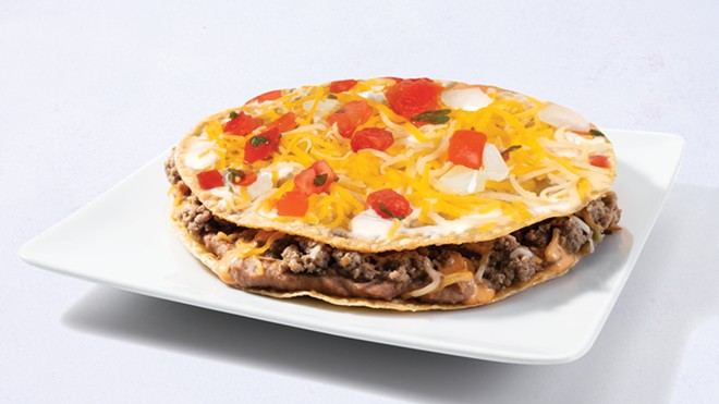 Taco Cabana's take on the Mexican Pizza features cheese, beef, beans and dressing between two fried tortillas. - Courtesy Photo / Taco Cabana