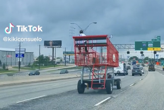 Jay Ruelas, the man driving the super-sized shopping cart, owns a company that specializes in custom automobiles. - TikTok / Kiki Consuelo