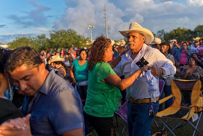 Luisa and Antonio Perez dance to the band Tigrillos at the Festival Viva Mexico in Corpus Christi on Sept. 8, 2013. - Texas Tribune / Eddie Seal