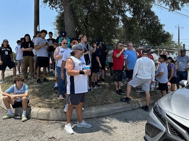 Hundreds of fans gathered outside of San Antonio International Airport's private jet terminal Friday anxiously awaiting the arrival of Spurs draft pick Victor Wembanyama. - Michael Karlis