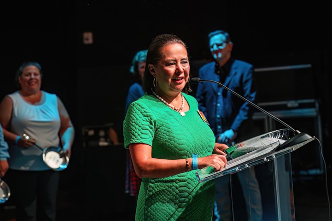 Blanca Aldaco accepts the Outstanding Restaurateur of the Year award. - Courtesy Photo / Texas Restaurant Association