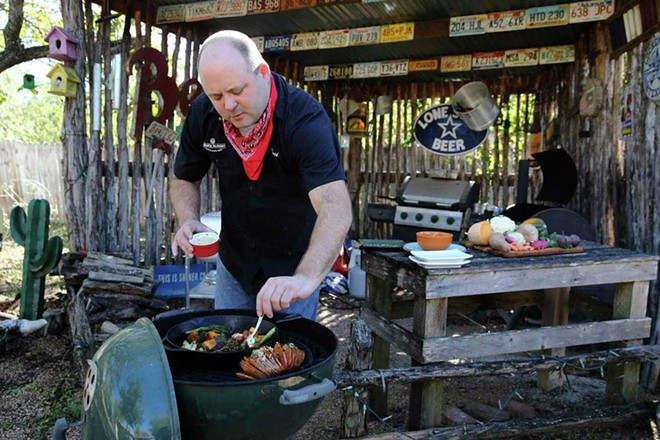 San Antonio barbecue aficionado and journalist Chuck Blount cooks up barbecue in his backyard. - Courtesy Photo / Texas Kosher BBQ Championship
