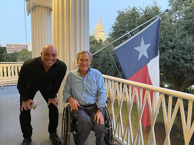 Podcaster Joe Rogan (left) and Gov. Greg Abbott pose for a photo op in Austin. Both have done a disservice to Texans when it comes to COVID-19 and public health. - Twitter / GregAbbott_TX