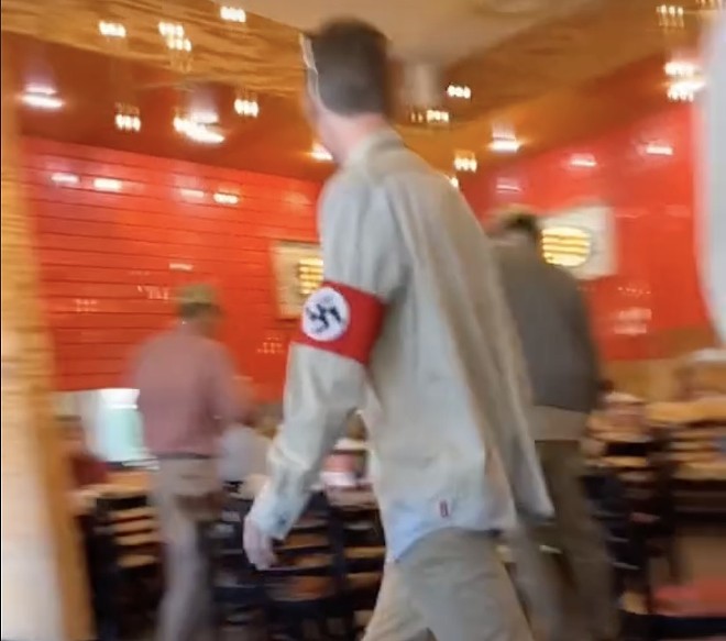A group men wearing Nazi attire were spotted eating at a Fort Worth Torchy's location on Sunday. - TikTok / @dropdeadgorjessx