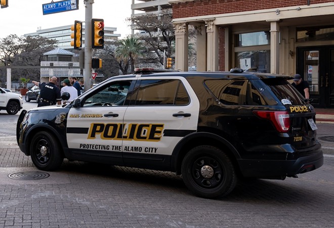 A San Antonio police cruiser closes off a section of street downtown in this 2022 photo. - Shutterstock / JHVEPhoto