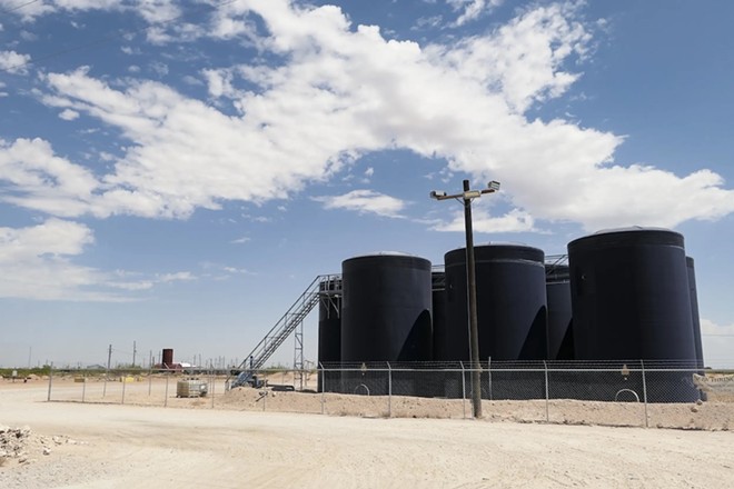 Produced water stored in tanks outside Pecos in August 2023. Spills of produced water often occur at storage tanks or from pipelines. - Inside Climate News / Martha Pskowski