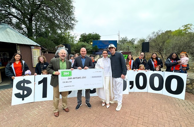 San Antonio CEO Tim Morrow (second from left) receives a giant $10 million check from the Ralston Family Charitable Foundation on Friday. - Courtesy Photo / San Antonio Zoo