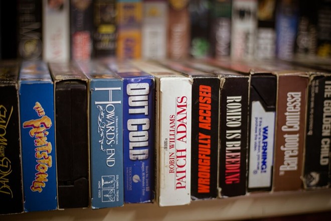 There's a handful of brick-and-mortar stores catering to collectors' videotape habits. - Unsplash / Delaney Van