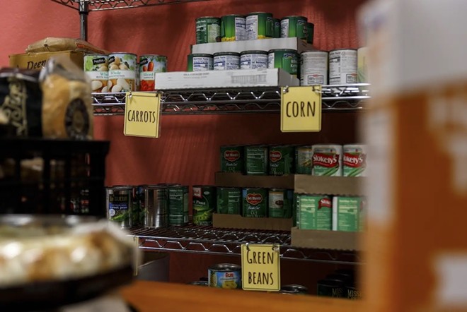 Food and supplies are stored at Manos de Cristo food pantry in Austin, Texas on Nov. 13. Clients typically come to the food pantry once every two months. - Texas Tribune / Julius Shieh