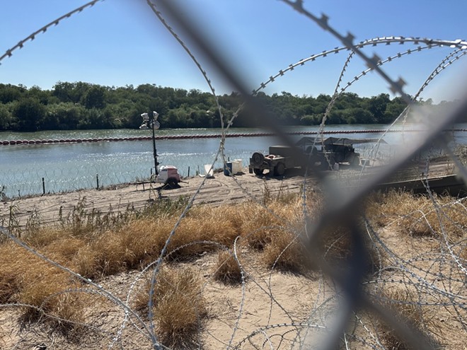 Razor wire barriers installed under Gov. Greg Abbott's Operation Lone Star cut off access to the Rio Grande. - Michael Karlis