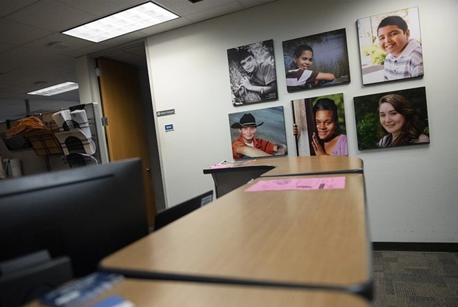 Heart Galleries, portraits of adoptable children, on display at the Child Protective Services office at Texas Department of Family and Protective Services in Austin on Nov. 14, 2019. - Texas Tribune / Eddie Gaspar
