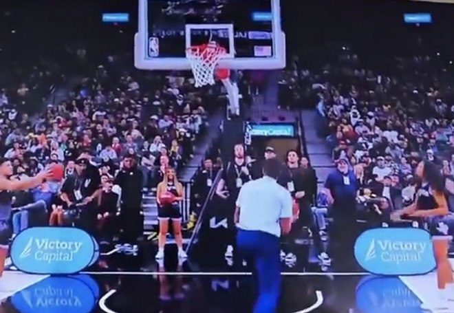 The man air-balled one layup and missed the rim on three other shot attempts during a fan contest as the Spurs took on the Los Angeles Lakers on Wednesday. - Twitter / @HubieTalksHoops