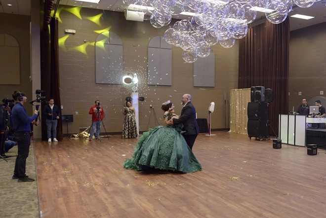 Sienna Raley dances with her father Troy for the Father-Daughter Waltz at her quinceañera. - Texas Tribune / Joel Andrews