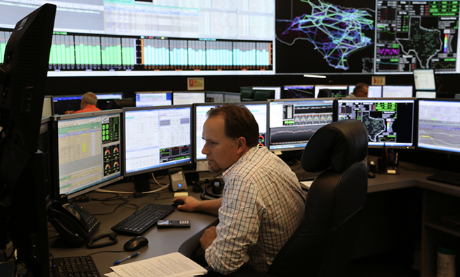 An ERCOT employee monitors the state's electrical grid. - Courtesy Photo / ERCOT