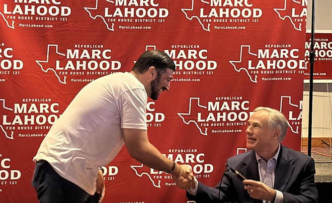 Texas House District 121 candidate Marc LaHood shakes hands with Gov. Greg Abbott during Tuesday's campaign event. - Michael Karlis