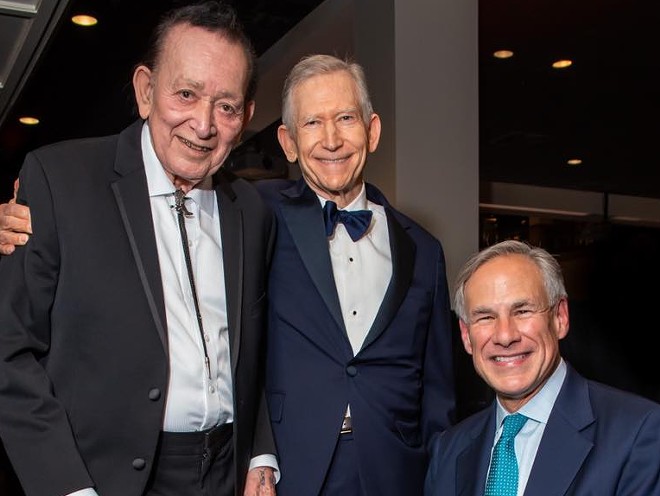 Founder of H-E-B Charles Butt (center) poses with San Antonio music icon Flaco Jimenez and Gov. Greg Abbott at an event. - Photo via Facebook / H-E-B