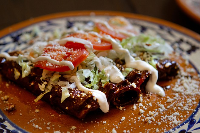 Maíz's Enchiladas Maria features cortina cheese and mole sauce. - Allysse Shank-Rivas