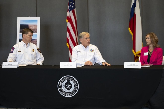 exas Governor Greg Abbott, center, speaks at a press conference with Nim Kidd chief of the Texas Division of Emergency Management, left, and Hutchinson County Judge Cindy Irwin, right, Friday, March. 1, 2024, in Borger, Texas. - Texas Tribune / Justin Rex