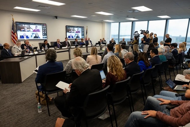 Members of the public and media fill a packed room during a Texas Medical Board meeting in the George H.W. Bush Building in Austin on March 22, 2024. - Texas Tribune / Maria Crane