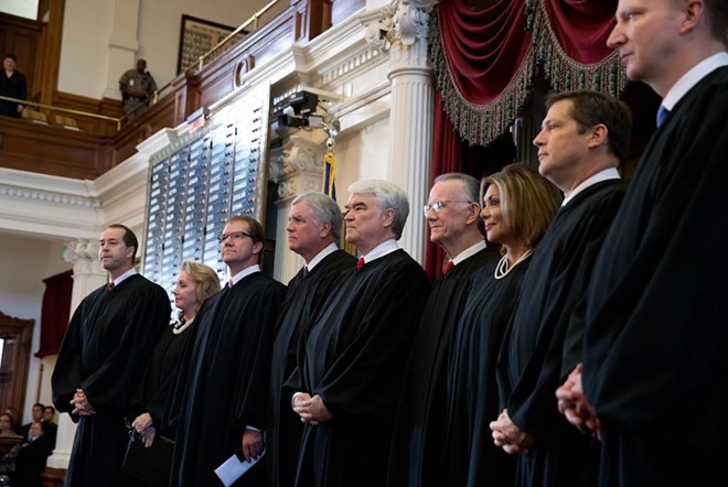 Texas Supreme Court Justice John Devine, far left, with fellow jurists on the state House floor in Austin in 2013. - Texas Tribune / Bob Daemmrich