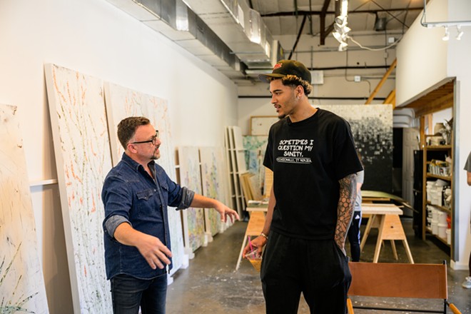 Jeremy Sochan visits with Douglas Galloway in the artist’s studio. - Jaime Monzon
