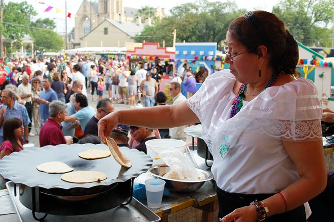 Maria's Tortillas serves crisp yet pliable corn tortillas that are buttered and filled with cheddar cheese and salsa. - Courtesy Photo / San Antonio Conservation Society