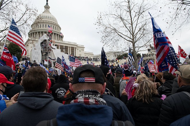 Trump supporters storm the U.S. Capitol during the January 6 insurrection. - Shuttersrock / Gallagher Photography