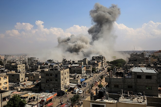 Smoke rises after Israeli air strikes in the city of Rafah in the southern Gaza Strip last October. - Shutterstock / Anas-Mohammed