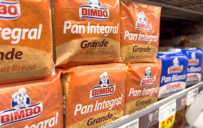 Bimbo Bakeries bread lines a California store shelf. The company owns dozens of bakery brands. - Shutterstock / The Image Party