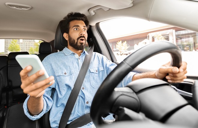 On average, 3,132 people die in fatal crashes involving distracted drivers each year, according to a new study. - Shutterstock / Prostock-studio