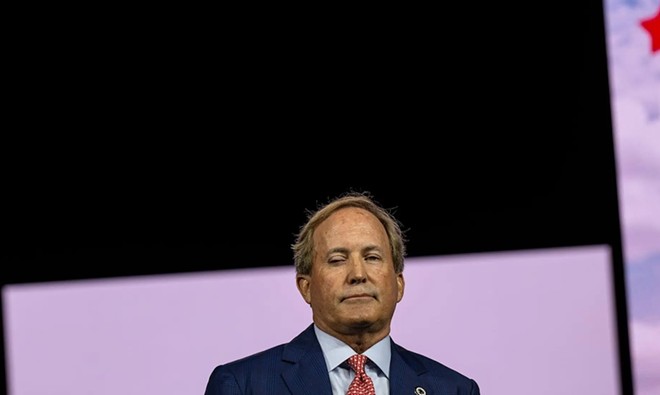 Texas Attorney General Ken Paxton, at a state Republican convention in May, has sued to block federal protections for transgender workers. - Texas Tribune / Eli Hartman