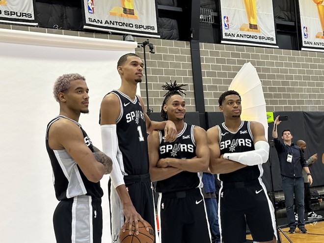 Jeremy Sochan, Victory Wembanyama, Devin Vassell and Keldon Johnson (left to right) pose for a photo during the San Antonio Spurs' 2023 Media Day event. - Michael Karlis