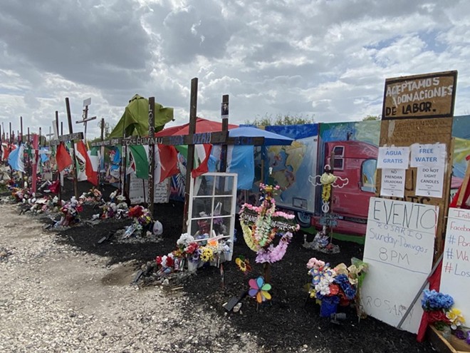 Alamo City residents erected a makeshift memorial at the site where 53 migrants died of heat-related illness in the back of a tractor-trailer in June 2022. - Sanford Nowlin