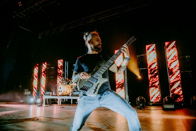 Bassist Eugene Abdiukhanov holds down the bottom end during a Jinjer show in San Antonio. - Oscar Moreno