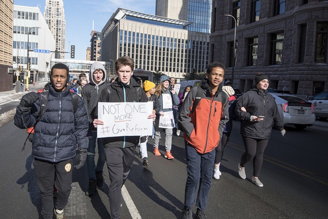 Students march in Minneapolis on February 21 to protest lax gun laws. - FLICKR CREATIVE COMMONS VIA FIBONACCI BLUE