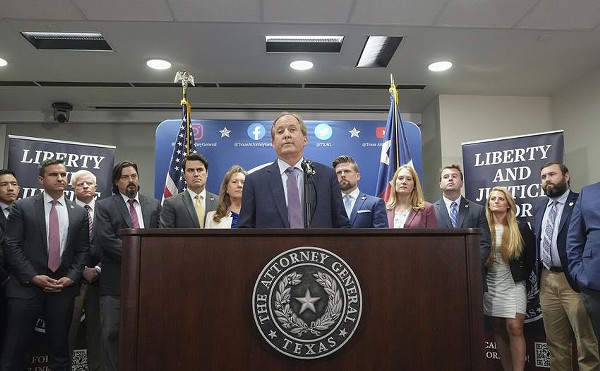At a press conference on Friday, Attorney General Ken Paxton with aides, from left: Tommy Tran, executive assistant; James R. Lloyd, associate deputy attorney general for civil litigation; Austin A. Kinghorn, associate deputy attorney general for legal counsel; Ryan Fisher, director of government relations; Joshua Reno, deputy attorney general for criminal justice; Suzanna Hupp, special adviser; Brent Webster, first assistant attorney general; Lesley French, chief of staff; George Lane, adviser; Paige Willey, deputy communications director; and Ralph M. Molina, deputy attorney general for legal strategy.