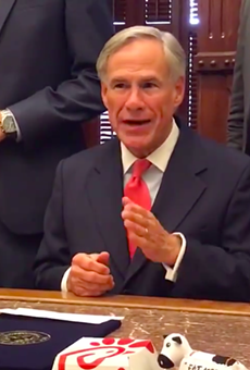 Gov. Greg Abbott makes a point about religious freedom with Chick-fil-A cups carefully arranged in the shot.