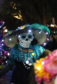 MPeople view a procession at Muertos Fest in La Villita. This year, the event is moving to Hemisfair.