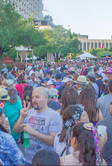 Revelers flood the popular Night in Old San Antonio Event during a past Fiesta.