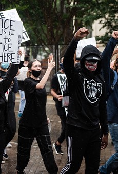 Protesters march at a recent San Antonio anti-police brutality demonstration.