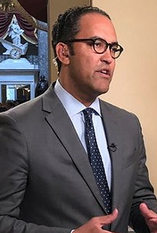 U.S. Rep. Hurd speaks to a television news crew in Washington.