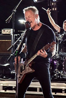 Metallica's James Hetfield growls it out during the band's performance that was broadcast to drive-in screens.