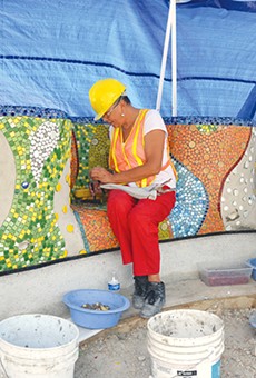 Dedicated workers have set thousands of pieces of glass and porcelain at Yanaguana Garden.