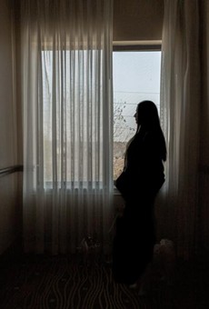 Lisa, an anonymous HPV patient living in a Houston hotel to escape domestic abuse, navigates the uncertainties of Planned Parenthood being withdrawn from Medicaid coverage.
