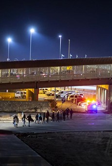 U.S. Customs and Border Protection agents escorted a group of migrants near the Paso del Norte International Bridge in El Paso in 2019.