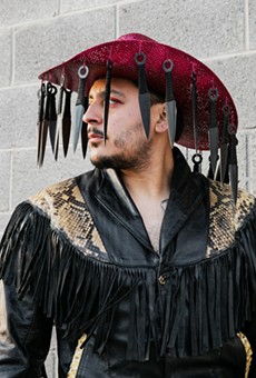El Paso-based photographer Jeanette Nevarez captured Villalobos in a hat he hopes to use in a future performance.