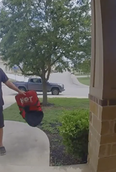 San Antonio Pizza Hut employee fired for throwing pizza onto customer's doorstep.